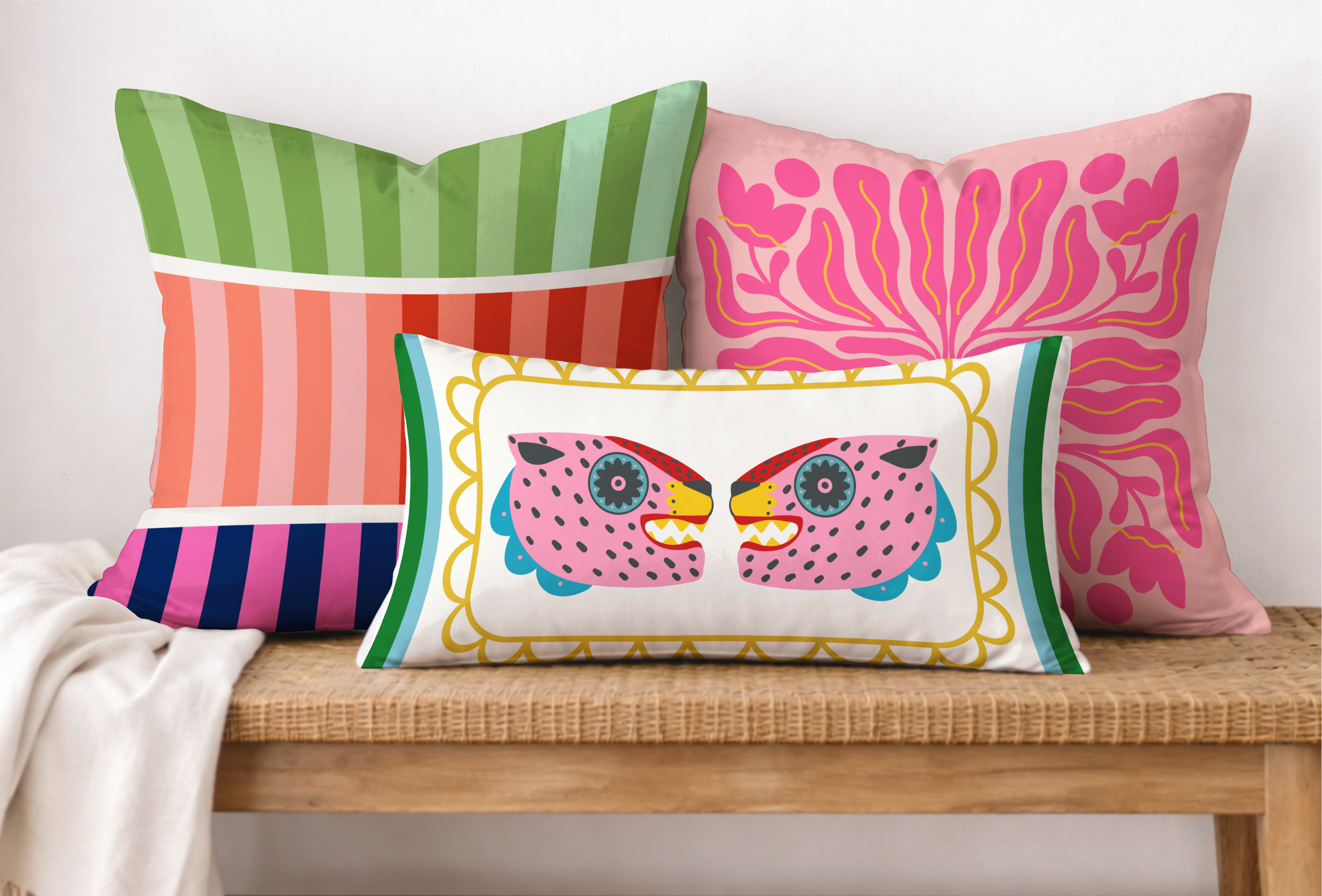 Colorful throw pillows arranged on a wooden bench